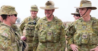 Chief of Army Lieutenant General Angus Campbell (right), and Regimental Sergeant Major-Army Warrant Officer Don Spinks, receive a brief from Sergeant Peter Papalia during a visit to Task Group Taji 4 in Iraq. Photo by Corporal Kyle Jenner.