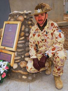 Sergeant Pete Rewko, 2nd/14th Light Horse Regiment (Queensland Mounted Infantry) and coordinator/co-builder of a Sunnyside Memorial at Talil, Iraq, displays the cairn after its dedication on 1 January 2008. The memorial commemorates the loss two soldiers – Privates Victor Jones and David McLeod of the Queensland Mounted Infantry – killed in action during the Boer War. Photo by Corporal Rob Nyffenegger.