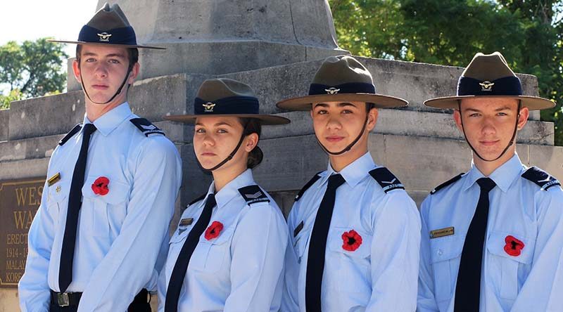 Cadet Sergeant Blake Lawrence, Cadet Sergeant Britney Shorter, Leading Cadet Zain Carse and Leading Cadet Byron Barnes-Williams of No 604 Squadron, wear poppies in the left-brett pocket flap, as allowed in the AAFC dress manual.