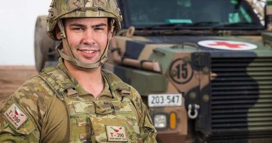 Australian Army soldier Corporal Levi Stripp is serving with Task Group Taji 4 at Taji Military Complex, Iraq, seen here with a Bushmaster Protected Mobility Vehicle - Ambulance. Photo by Corporal Kyle Jenner.