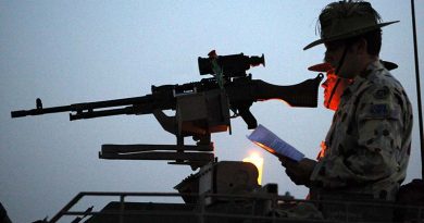 Members of the 2nd/14th Light Horse Regiment (Queensland Mounted Infantry) participate in the ANZAC Day Dawn Service at Talil, Iraq, 2008. Photo by Brian Hartigan.