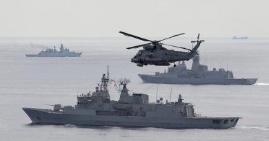 A Royal New Zealand Navy Sea Sprite flies over the formation, as warships from Australia, Malaysia, Singapore and New Zealand conduct a Photo Exercise during Bersama Shield 2017. Photo by Leading Seaman Bradley Darrell.