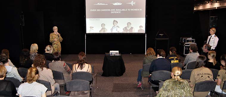 Major Genevieve Rueger and Petty Officer Denise Whiting delivering a “Women in the ADF” presentation. Photo by Pilot Officer (AAFC) Paul Rosenzweig.