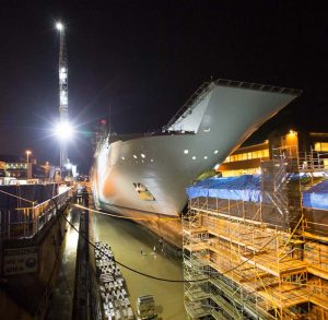 HMAS Adelaide rests on blocks in the Captain Cook Graving Dock at Fleet Base East, Sydney, after entering dry dock for maintenance. Photo by Leading Seaman Peter Thompson.