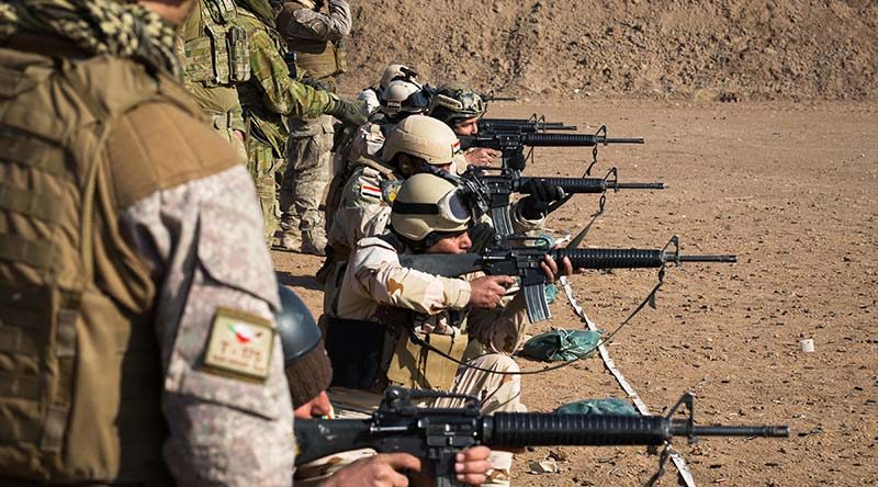 Australian and New Zealand Army trainers from Task Group Taji 4 conduct marksmanship training with an Iraqi Army training audience at Al Taqqadum, Iraq. ADF photo.