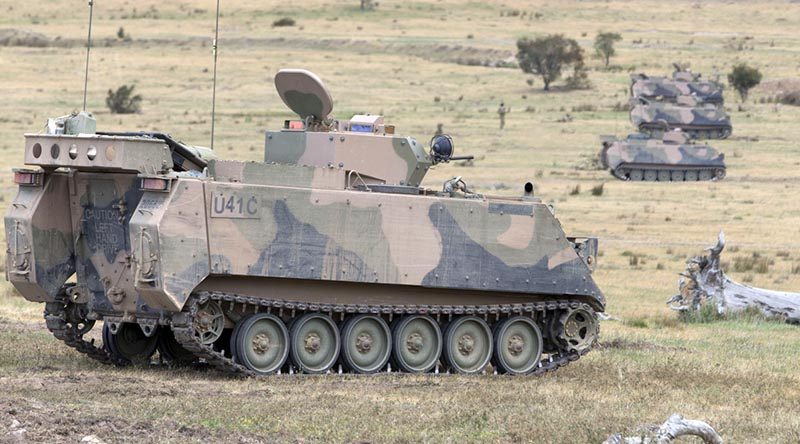 M113AS4 armoured personnel carriers. Photo by Corporal Steve Duncan.