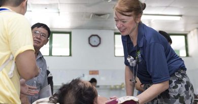 Royal Australian Navy Nursing Officer Lieutenant Commander Alison Zilko tends to a Vietnamese patient at the Emergency Reception at Da Nang General Hospital during Exercise Pacific Partnership 2017. Photo by Sergeant Ray Vance.