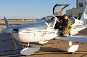 Cadet Corporal Benjamin Anderson from No 608 (Town of Gawler) Squadron AAFC prepares to undertake a PEX flight in a Tobago TB10 with pilot Bianca Wise from Flight Training Adelaide. Photo by Pilot Officer (AAFC) Paul Rosenzweig.