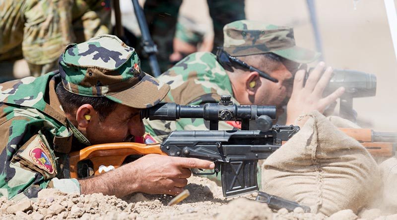 Iraqi Army Rangers practice firing at extended ranges with a Dragunov sniper rifle under the guidance of Australian and New Zealand Defence Force trainers from Task Group Taji 4 at Taji Military Complex, Iraq. Photo by Corporal Kyle Genner.