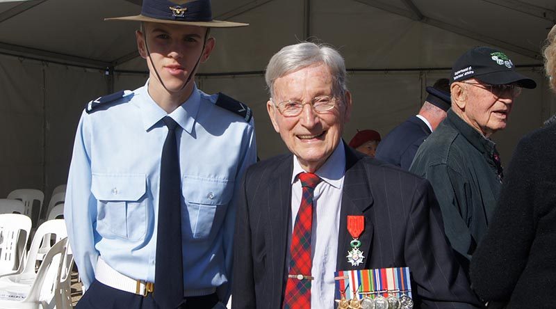 Leading Cadet Sean Fry from No 605 Squadron with former RAAF Warrant Officer Doug Leak, Bomber command veteran and recipient of the French Légion d’honneur. Image by Pilot Officer (AAFC) Paul Rosenzweig