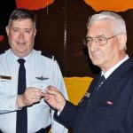 PLTOFF (AAFC) Dennis Medlow receives his Individual Proficiency Badge from the CO of 604 Squadron, FLGOFF (AAFC) John Bennett. Image by Pilot Officer (AAFC) Paul Rosenzweig