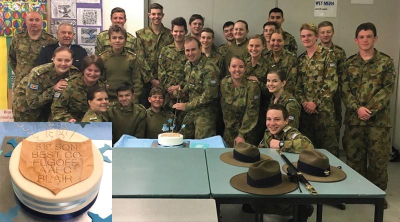 Outgoing Commanding Officer of No 619 Squadron FLGOFF(AAFC) Simon Blair cuts his farewell cake with members of the squadron. Image supplied by 610 SQN