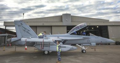 Leading Aircraftwoman Aimee-Rose Carter and Leading Aircraftman Fletcher Moulton perform routine checks on a newly arrived EA-18G Growler at No. 6 Squadron, RAAF Base Amberley. Photo by Corporal Brenton Kwaterski.