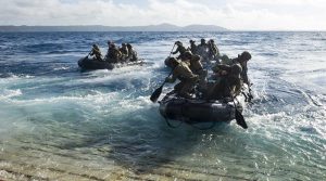 2RAR soldiers depart the well deck of USS Green Bay in combat rubber raiding craft during Talisman Saber 17. US Navy photo by Mass Communication Specialist 3rd Class Sarah Myers.