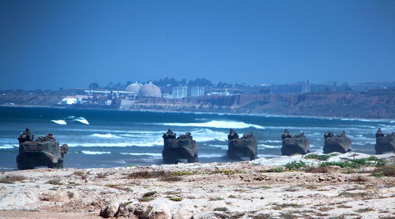 Marines with 3rd Assault Amphibian Battalion, and 4th AABn., perform an amphibious raid at Camp Pendleton, California. USMC photo by Corporal Joshua Young.