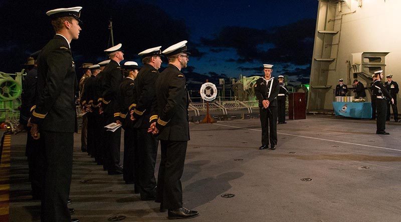 Crewmembers of HMAS Canberra III hold a memorial service to commemorate the 75 Anniversary of the loss of HMAS Canberra I during the Battle of Savo Island.