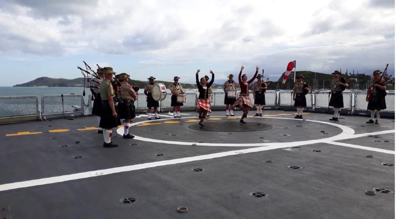 The Pipes and Drums, National Servicemen’s Memorial Band, perform aboard a French frigate during a successful trip to New Caledonia. Photo supplied.