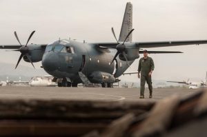 Royal Australian Air Force pilot Flight Lieutenant Oliver Kersnovski, from No. 35 Squadron, walks from a C-27J Spartan during Operation Hannah in Papua New Guinea. Photo by Corporal Jake Sims.