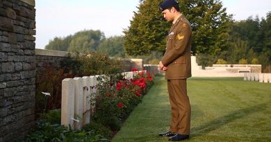 Corporal Kyle Genner visits his great-great-great-uncle Arthur Genner's grave at Buttes New British Cemetery, Zonnebeke, Belgium.