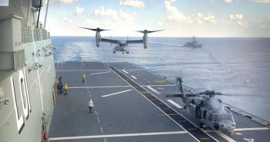 A United States Marine Corps MV-22 Osprey and a United States Navy Seahawk helicopter from USS Bonhomme Richard conduct deck landings on HMAS Adelaide, with HMAS Darwin in the background during Indo-Pacific Endeavour 2017. Photo by Petty Officer Andrew Dakin.
