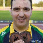 Royal Australian Air Force Pilot Officer Nathan Parker shows off two bronze medals he won during the first full day of competition at the 2017 Invictus Games in Toronto. Photo by Corporal Mark Doran.