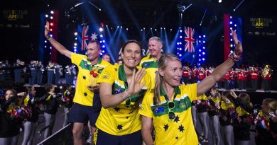 Australian athletes Chris Clark, Leading Aircraftwoman Melissa Roberts, Jason McNulty and Sarah Watson enter the 2017 Invictus Games opening ceremony in Toronto. Photo by Corporal Mark Doran.