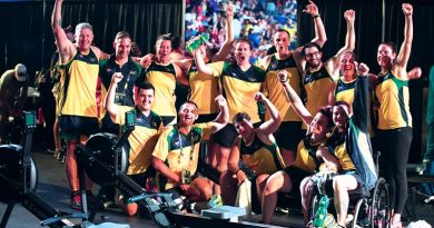 Australian Invictus Games indoor rowing team members are happy with their performance. Photo by Leading Seaman Jayson Tufrey.