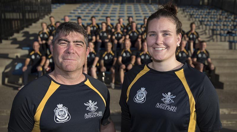 Australian Invictus Games team captains Sergeant Peter Rudland and Captain Emma Kadziolka, with the Aussie Team, at the Sydney Academy of Sport and Recreation, NSW. Photo by Corporal Jayson Tufrey.