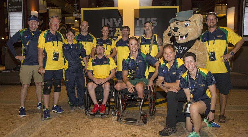 Some of the Australian Invictus Games athletes with the Invictus Games mascot at the Athletes Village, Toronto, Canada.