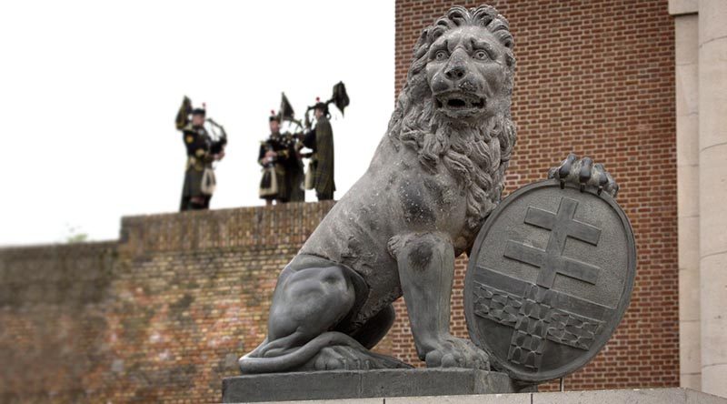 A Menin Gate Lion sits in front of the Menin Gate Memorial in Ieper, Belgium. Photo by Sergeant Christopher Dickson.