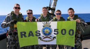 HMAS Sirius’ RAS-station 1 party, Leading Seaman Ball, Able Seaman Reace, Able Seaman Fitzpatrick, Able Seaman Chamberlain and Leading Seaman Judd, celebrate the ship’s 500th replenishment at sea. Photo by Able Seaman Luke van Beekhuizen.