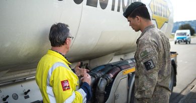 Private Lawrance Prasad from 2CSSB, Linton, receives familiarisation training from Steve Randall of Linfox Logistics NZ, before starting emergency fuel deliveries. NZDF photo.