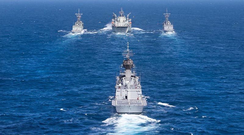 HMAS Toowoomba trails as HMAS Sirius conducts a dual replenishment at sea, refuelling HMAS Darwin (left) and HMAS Melbourne (right) simultaneously during Indo-Pacific Endeavour 2017. Photo by Leading Seaman Peter Thompson.