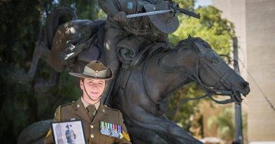 Australian Army Sergeant Janine Fabre visits the Park of the Australian Soldier in Be’er-Sheva ahead of the commemoration of the centenary of the Battle of Beersheba in Israel, with a photo of her great uncle who participated in the famous charge. Photo by Corporal Nunu Campos.