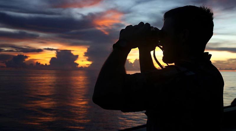 Lieutenant Paul Hodgins keeps watch from the bridge wing of HMAS Stuart on the way to Exercise Haedoli-Wallaby 2015. Photo by Able Seaman Kayla Hayes.