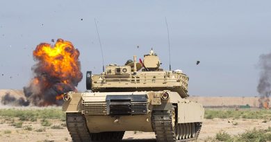 An Iraqi Army M1A1M Abrams tank provides cover during a Junior Leaders Course combined-arms training assessment at the Taji Military Complex, Iraq. Photo by Able Seaman Chris Beerens.