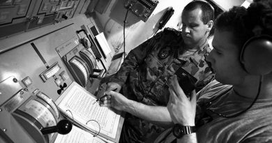 Mentoring below decks on HMAS Melbourne, Persian Gulf. Photo by Brian Hartigan, 2012.