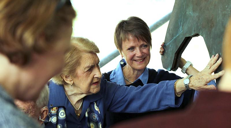 Long-time member of ‘Friends of Sandy and the Australian Light Horses’ Dorothy Hanlon touches the Sandy the Light Horse memorial after its unveiling. Photo by Corporal Veronica O'Hara.