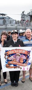 Petty Officer Cassie St John with her parents Gillian and Wayne. Photo by Able Seaman Kieran Dempsey.