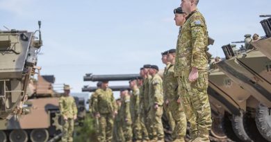 Major General Fergus McLachlan reviews the 1st Armoured Regiment first parade in Adelaide after the unit relocated from Darwin. Photo by Corporal Craig Barrett.