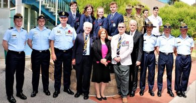 Modbury High School Remembrance Day ceremony participants (front row, from left): CCPL Joshua Watson (Guard Commander); CCPL Anthony Sanchez; FLGOFF (AAFC) Paul Rosenzweig; Don Cameron; Joanne Costa, Principal; Brian Selby; David Kschammer, Deputy Principal; LCDT Zain Carse; LCDT Mikale Durham; LCDT Byron Barnes-Williams. Image courtesy Modbury High School.