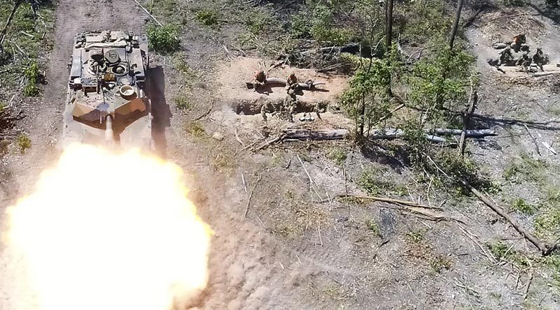 An M1A1 Abrams Main Battle Tank fires on Exercise Diamond Run 2017. Photo by Captain Anna-Lise Brink.