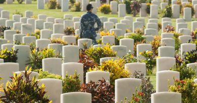 A RAAF member of the HMAS Adelaide crew walks through the headstones of Bomana Commonwealth War Cemetery, in Papua New Guinea, during Indo-Pacific Endeavour 2017. Photo by Private Roger Brennan.