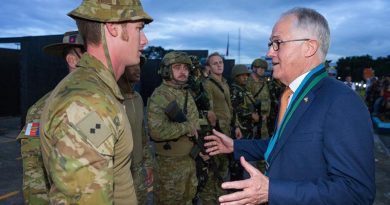 Australian Army officer Lieutenant Wes Walsh talks with Prime Minister of Australia Malcolm Turnbull after an urban-combat-skills demonstration at the Armed Forces of the Philippines Headquarters in Manila. Photo by Corporal Kyle Genner.