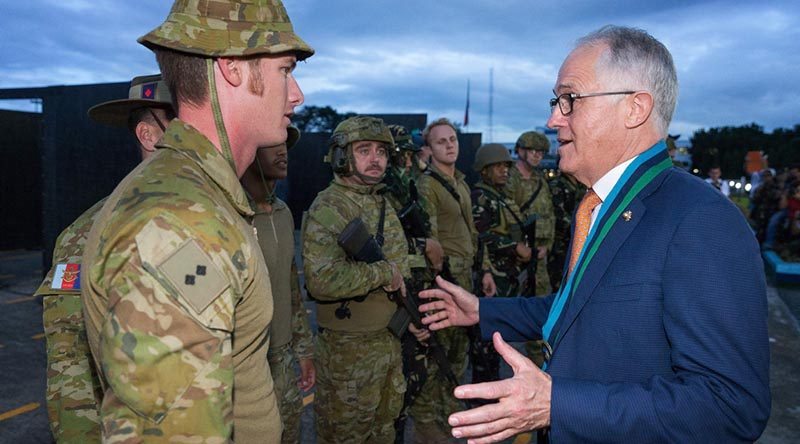 Australian Army officer Lieutenant Wes Walsh talks with Prime Minister of Australia Malcolm Turnbull after an urban-combat-skills demonstration at the Armed Forces of the Philippines Headquarters in Manila. Photo by Corporal Kyle Genner.