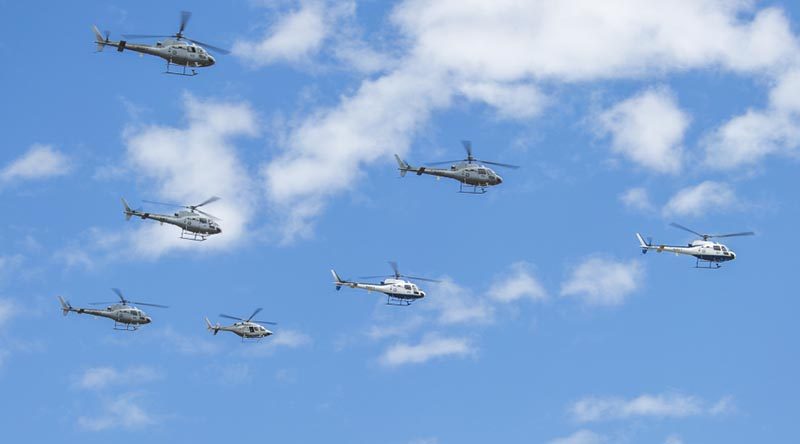 Royal Australian Navy AS 350BA Squirrel Helicopters from 723 Squadron conduct a six-ship (sic) formation fly past over HMAS Albatross.