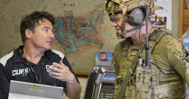 A Defence Science and Technology employee debriefs a soldier after an activity during the 2017 Contested Urban Environment Strategic Challenge at the old Adelaide Dental Hospital, South Australia. Photo by Corporal Craig Barrett.