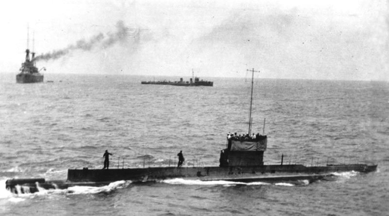 Last known image of AE1, 9 September 1914 – five days before she was lost – with HMAS Ships Australia and Yarra in the background.