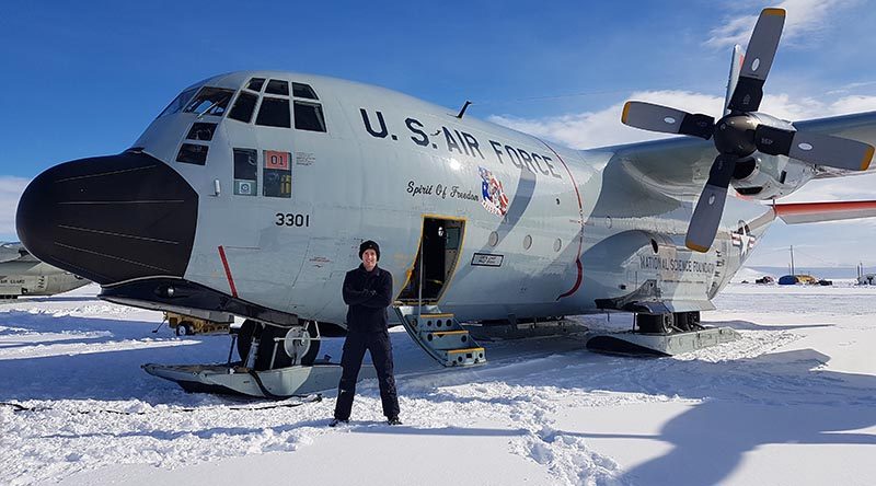 Aircraft Technician Corporal Wade Phelps from the Royal New Zealand Air Force with a US LC-130 'Skibird' at Williams Field in Antarctica. NZDF photo.