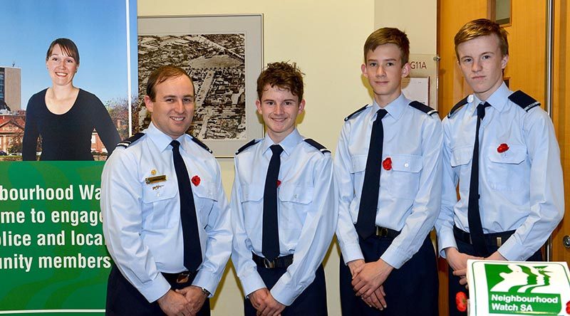 Flying Officer (AAFC) Simon Blair, Commanding Officer of No 605 (City of Onkaparinga) Squadron with Cadets Darcy Needle, Ethan O’Connor and Joshua Duncan. Photo ourtesy of SA Police.